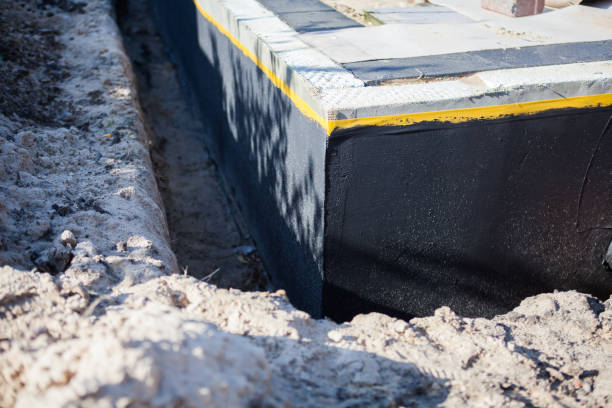 Professional Emergency Waterproofing technician working in Oswego, KS